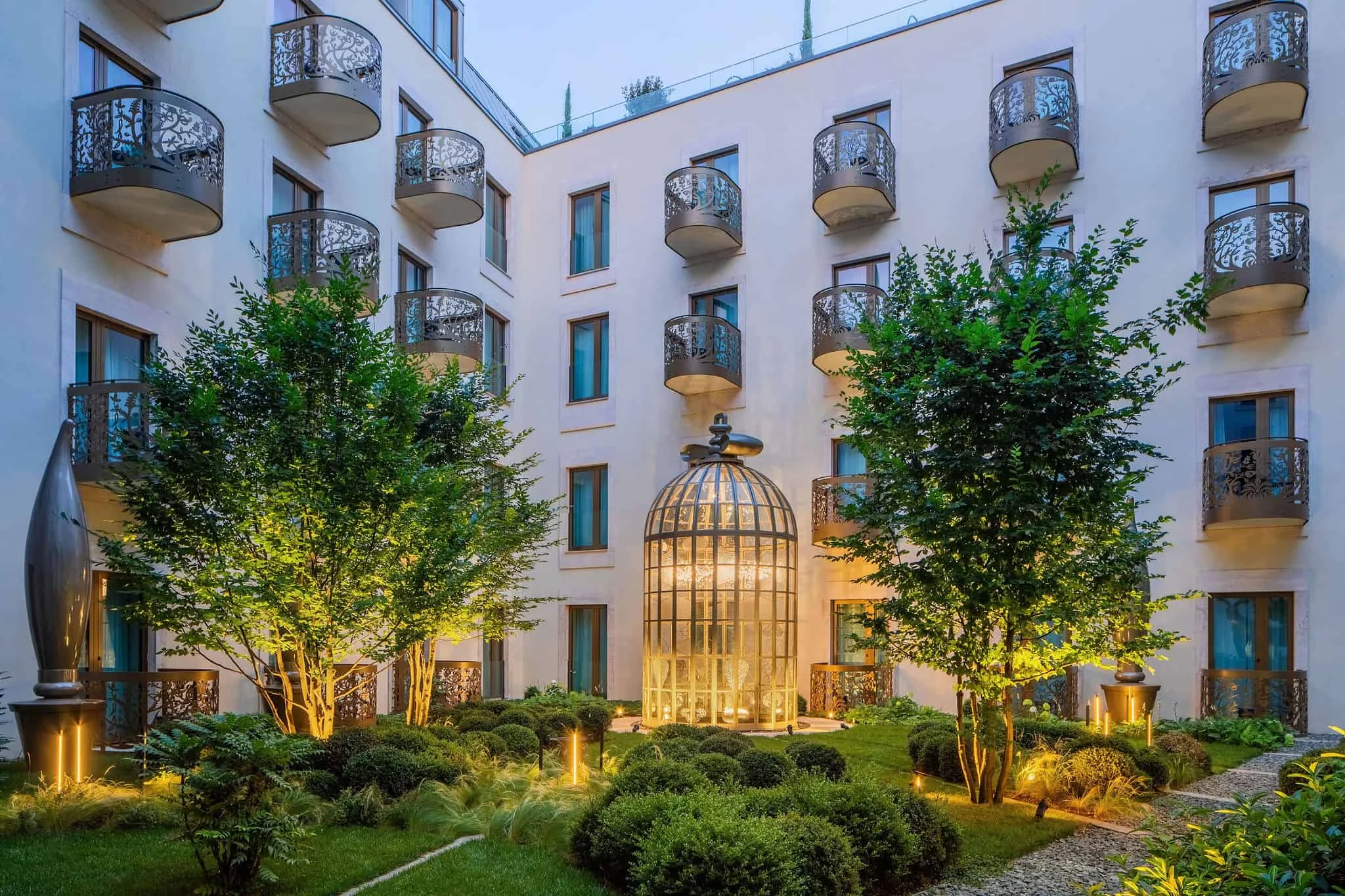 Landscaped hotel courtyard with contemporary seating in Budapest